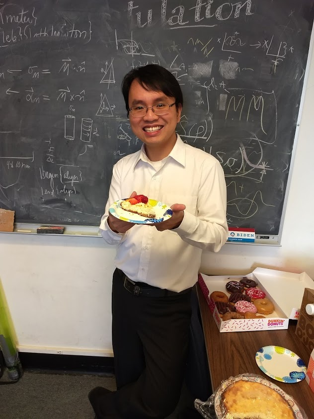 photo of Hoang Nguyen celebrating his successful thesis defense
